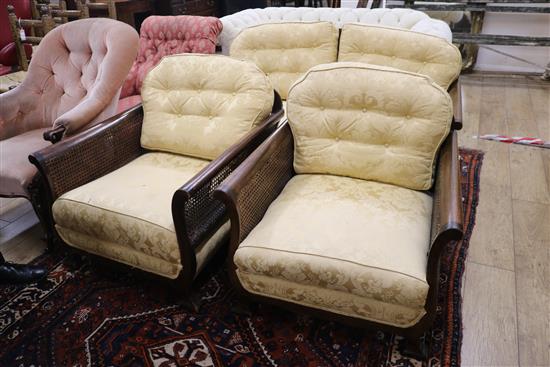 A mahogany and double canework bergere suite Sofa W.145cm